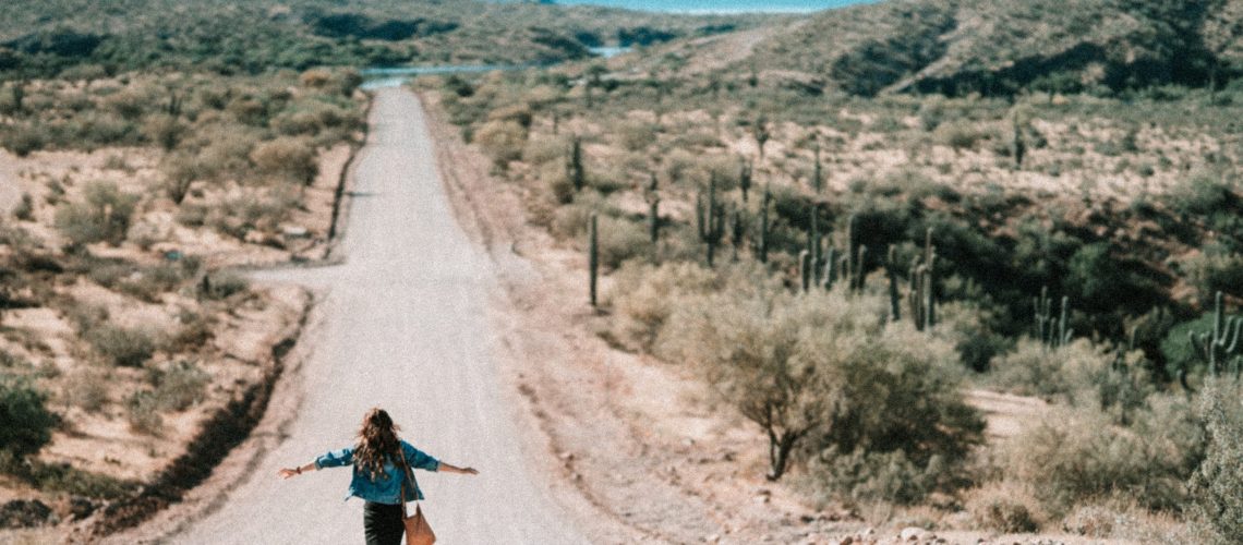 woman-walking-on-dirt-road-3889965